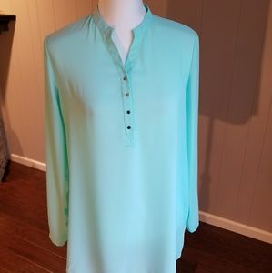 Sheer long sleeved mint green blouse